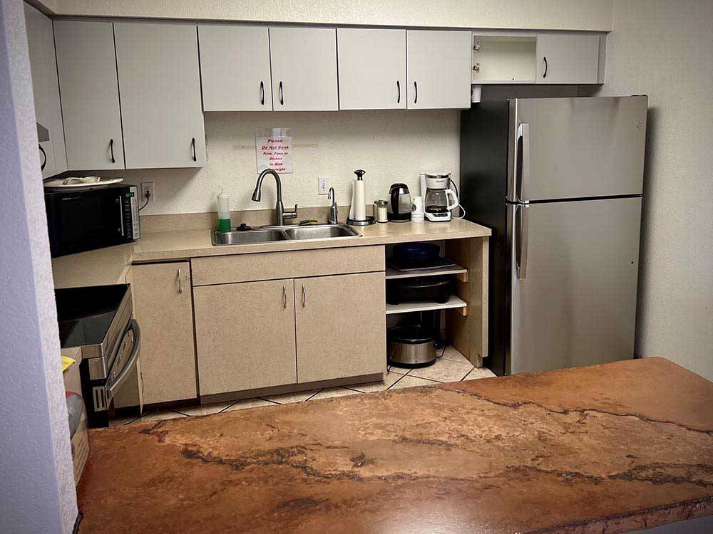 The clean kitchen area at DISTANT DRUMS RV RESORT