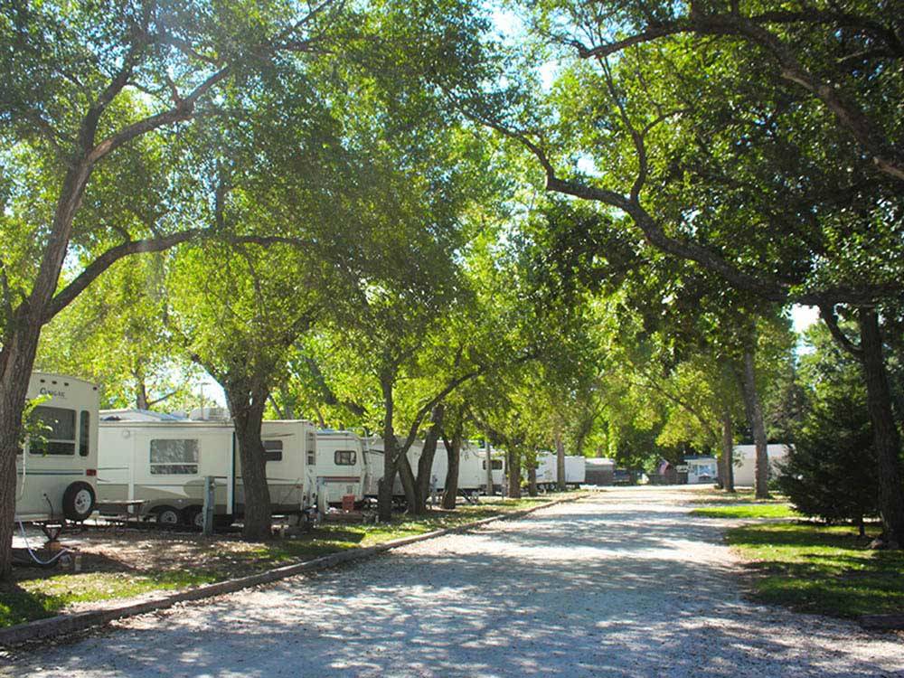 Trailers camping at campsite at DEER GROVE RV PARK