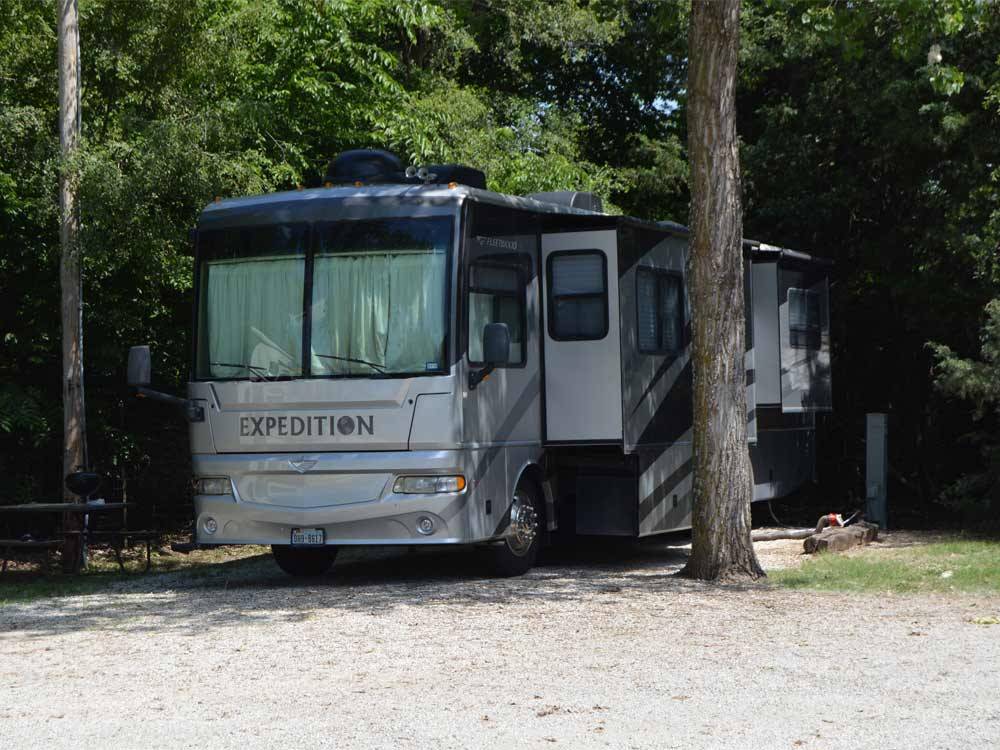 RV parked at campsite at DEER GROVE RV PARK