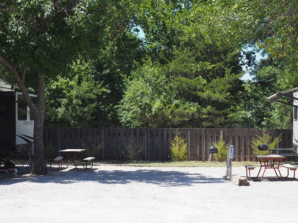 Space between campsites with lots of rooms for barbecues at DEER GROVE RV PARK