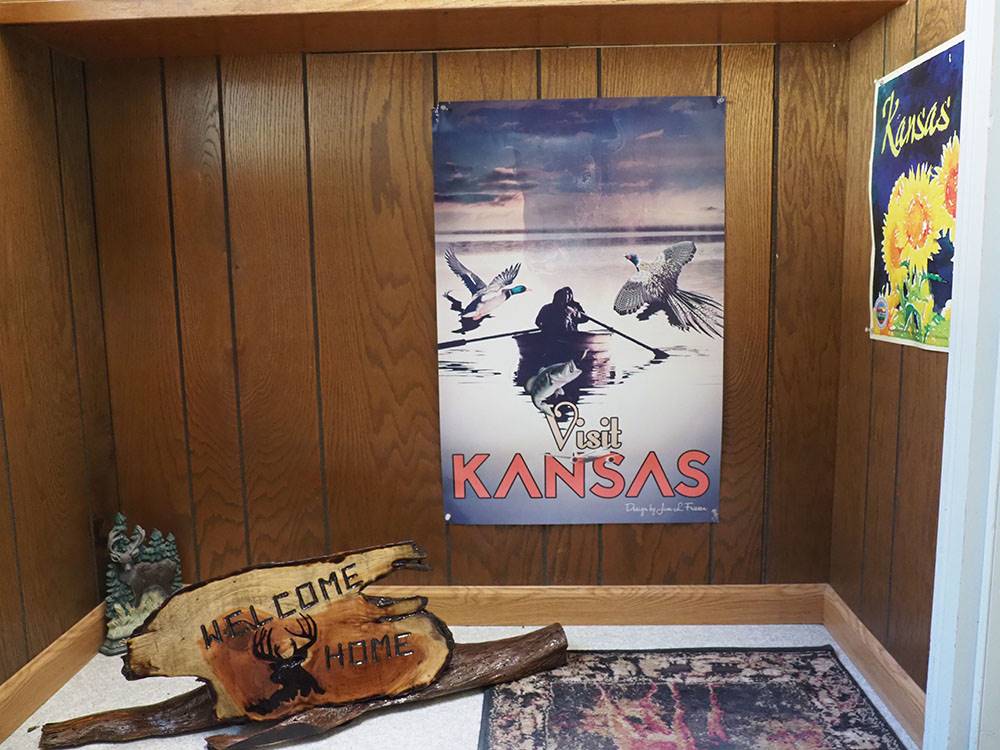 Room with posters celebrating Kansas at DEER GROVE RV PARK