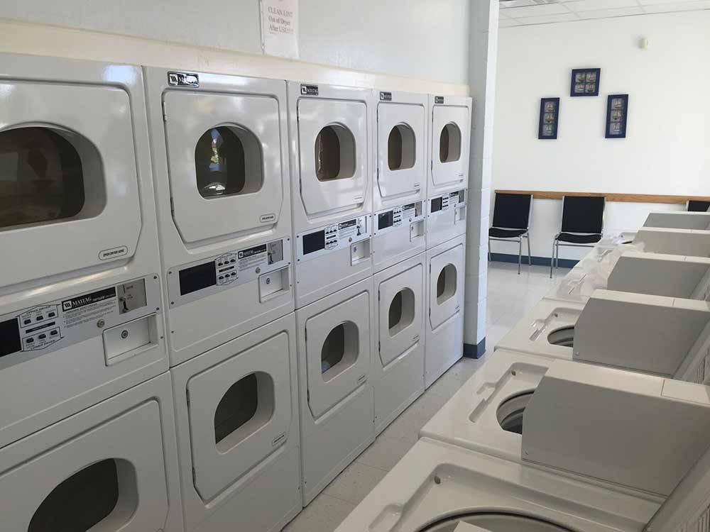 Laundry room with washer and dryers at SPARKS MARINA RV PARK