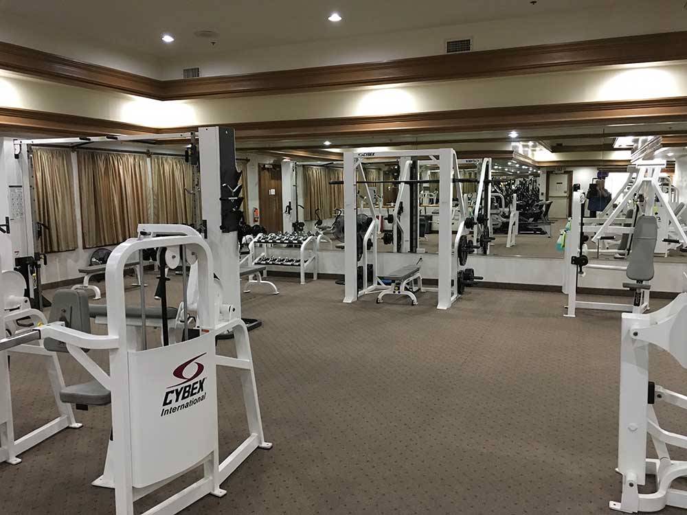 Exercise room with gym equipment at NEVADA TREASURE RV RESORT