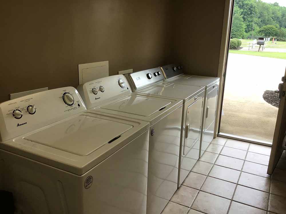 A line of washing machines at CENTURY CASINO & RV PARK