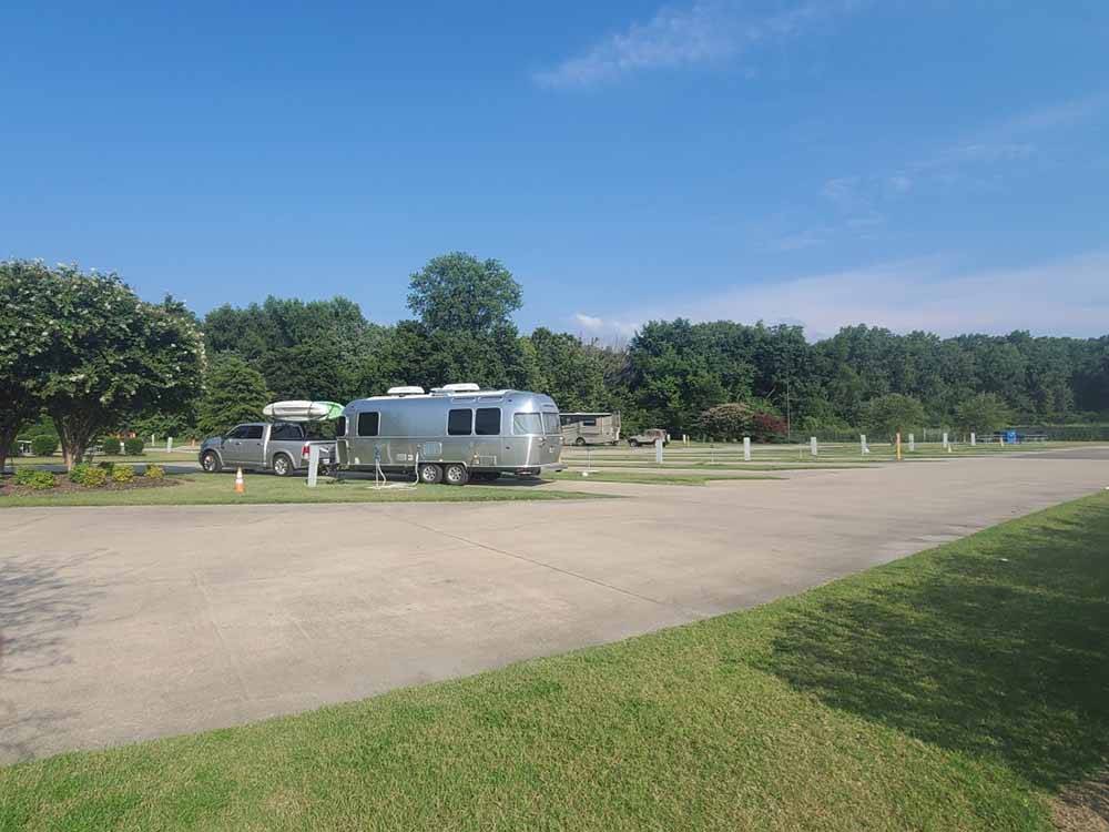 A long row of paved RV sites at CENTURY CASINO & RV PARK