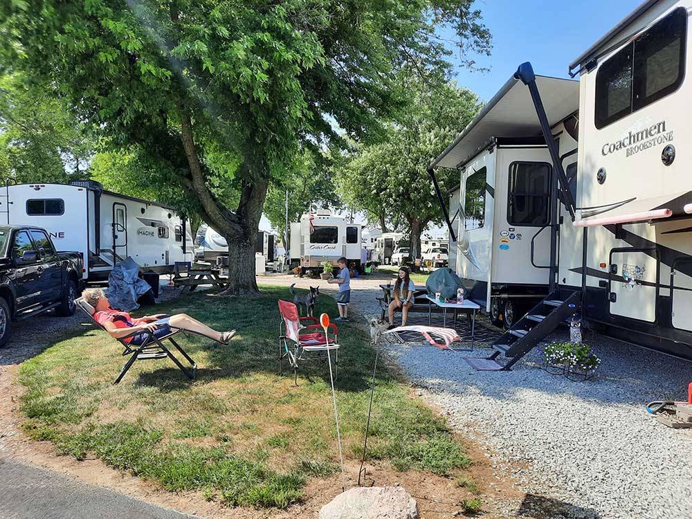 People relaxing in campsites at LAKE HAVEN RETREAT
