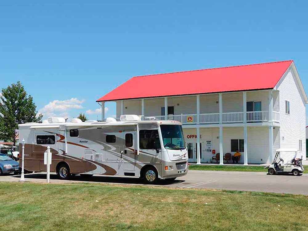 A motorhome at the registration building at MOUNTAIN HOME RV RESORT