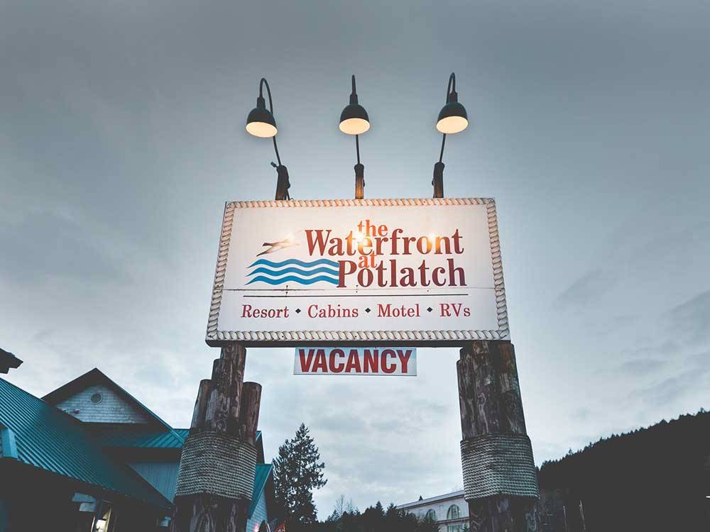 Main business sign near entrance at THE WATERFRONT AT POTLATCH RESORT & RV PARK