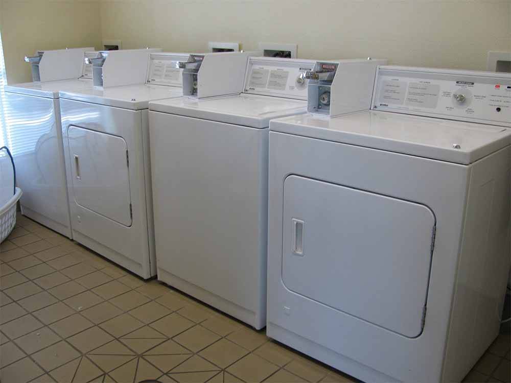 A row of washers and dryers at KIT FOX RV PARK