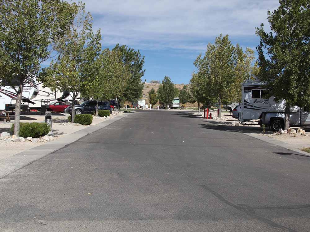 Paved road leading to RV spots at IRON HORSE RV RESORT