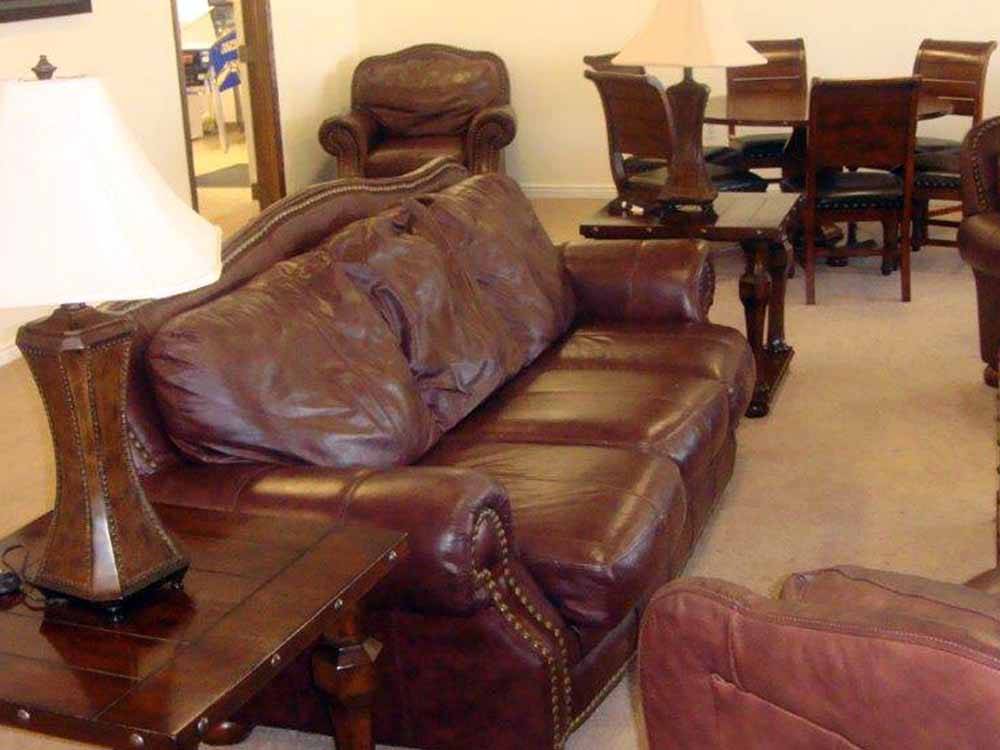 Leather furniture inside lounge at IRON HORSE RV RESORT