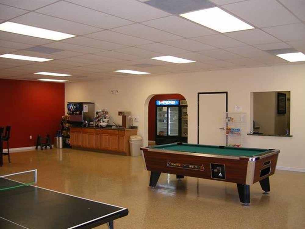 Pool tables inside lounge at IRON HORSE RV RESORT