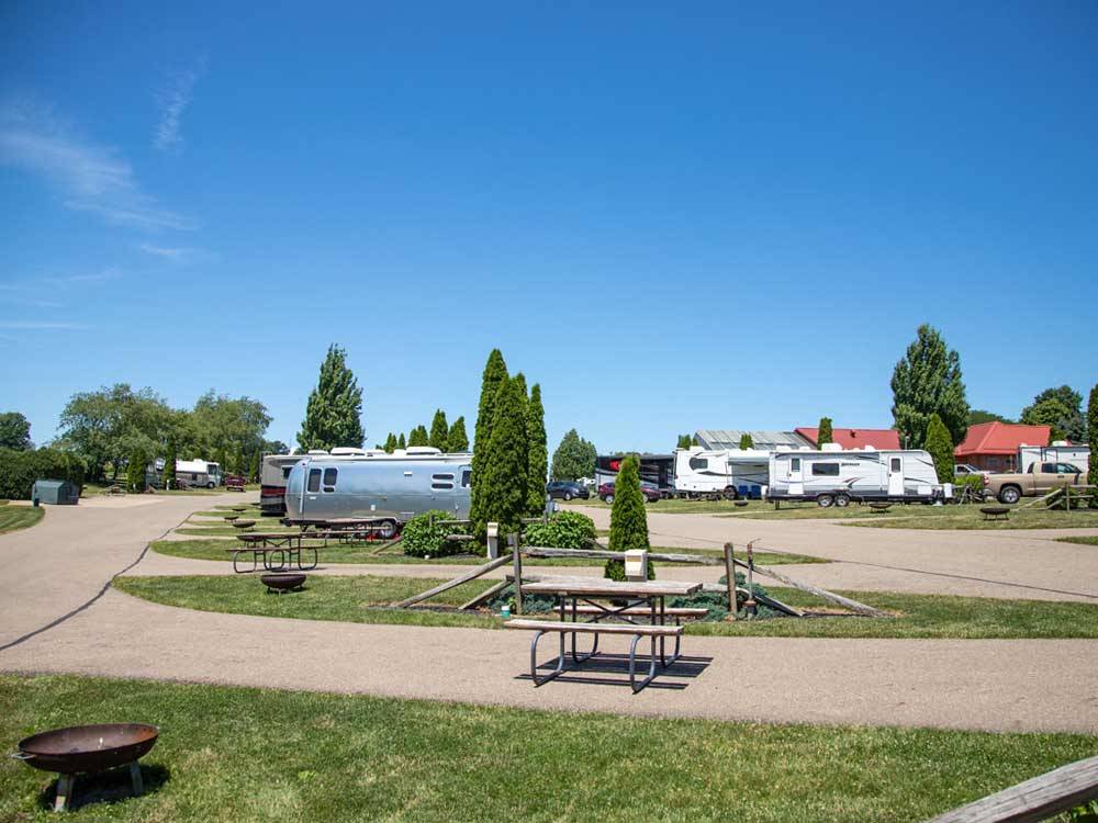 A picnic table in an RV site at EVERGREEN PARK RV RESORT