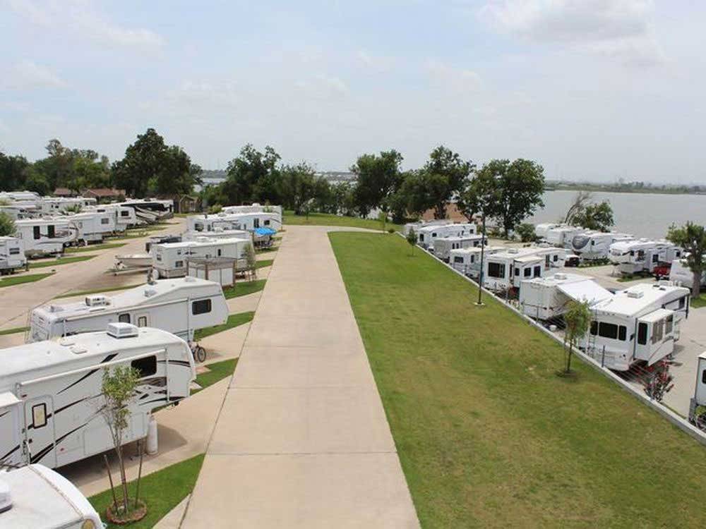 RVs and trailers in sites at SAN JACINTO RIVERFRONT RV PARK