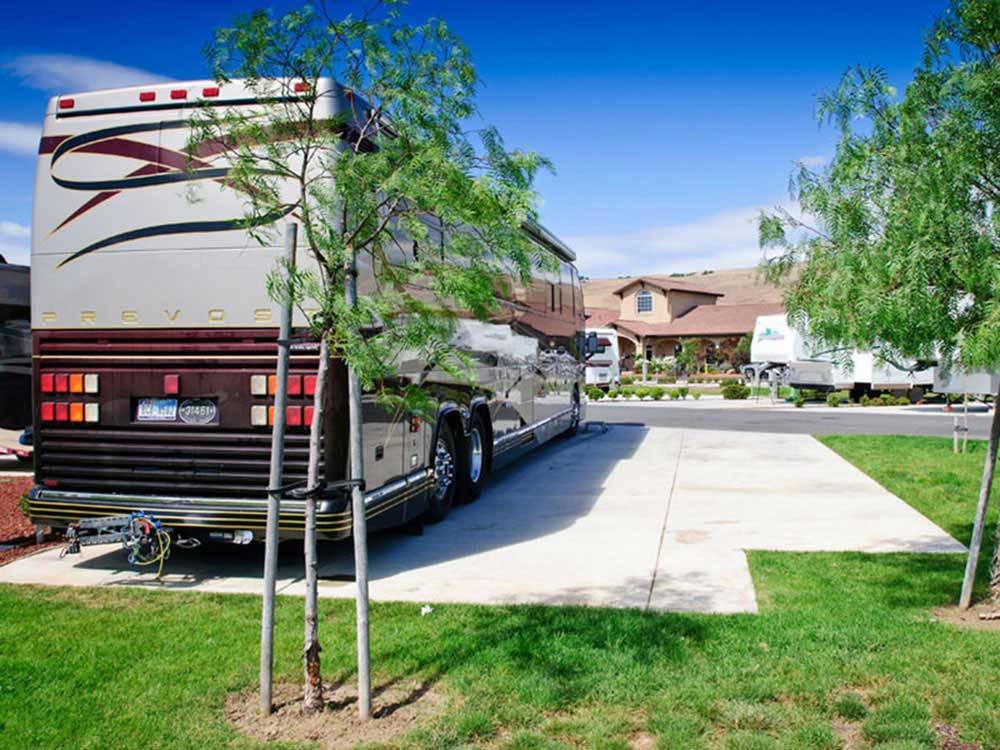 RV parked at campsite at COYOTE VALLEY RV RESORT