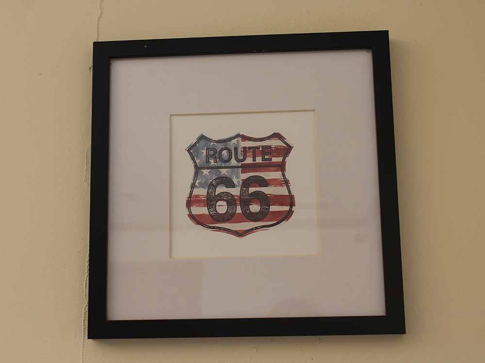 A piece of artwork of a Route 66 sign at OAK GLEN RV PARK