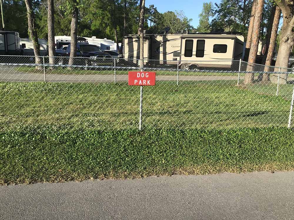 The fenced in dog park at SOUTHERN RETREAT RV PARK