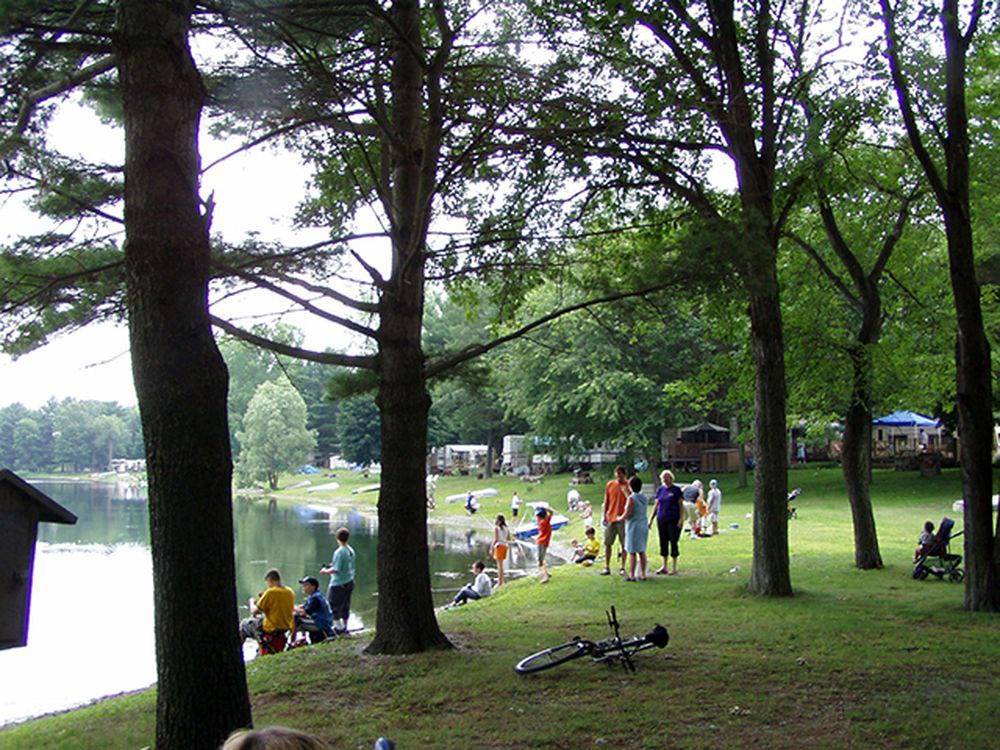 Campers enjoying the lake at WAUBEEKA FAMILY CAMPGROUND