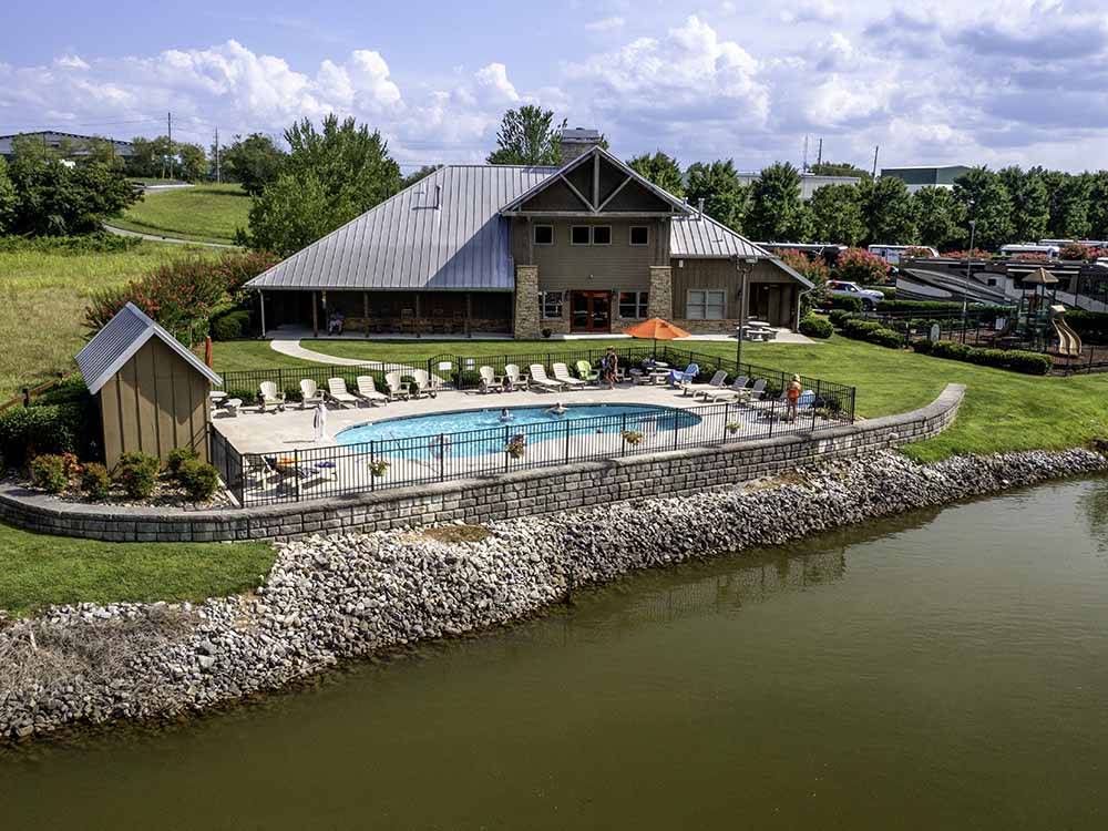 The swimming pool overlooking the river at TWO RIVERS LANDING RV RESORT