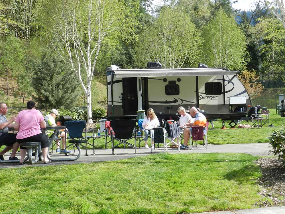 Campers relaxing at SEVEN FEATHERS RV RESORT