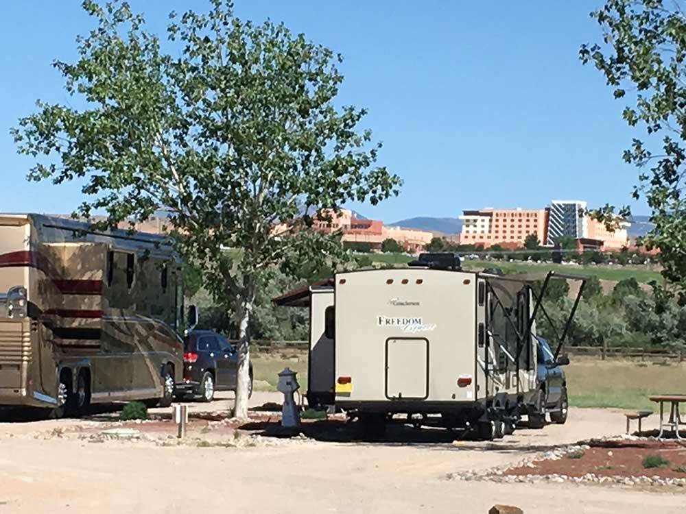 RVs in sites with view of the resort at ISLETA LAKES & RV PARK