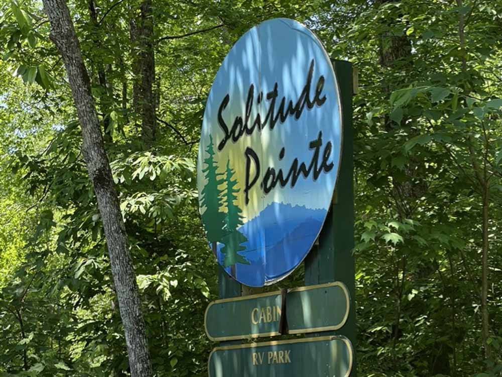 The front entrance sign at SOLITUDE POINTE CABINS & RV PARK