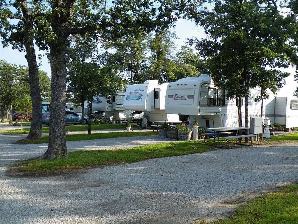 A line up of 5th-wheel trailers at BENNETT'S RV RANCH