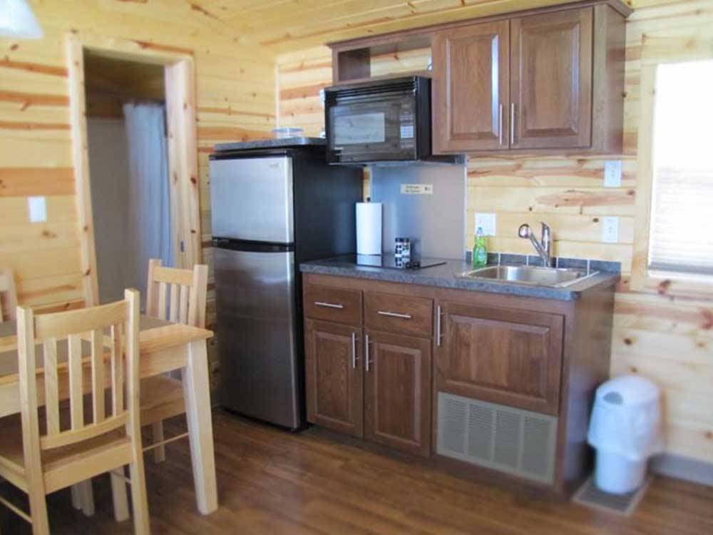 Small kitchen in private cabin at CAMPING POKEMOUCHE