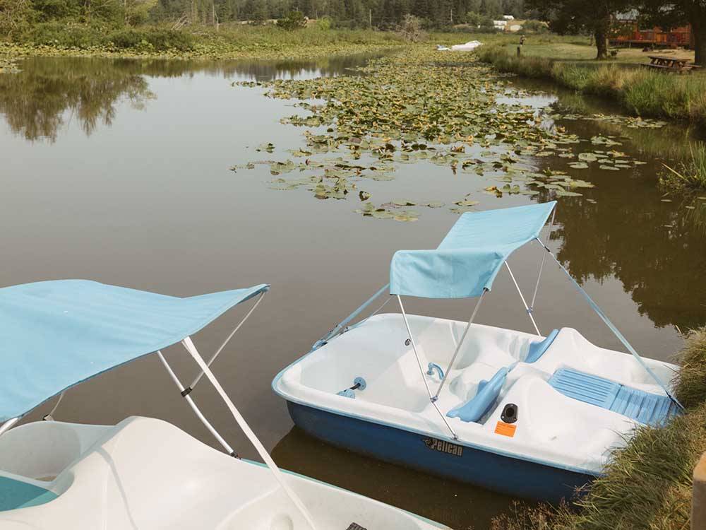 A couple of paddle boats at SILVER COVE RV RESORT