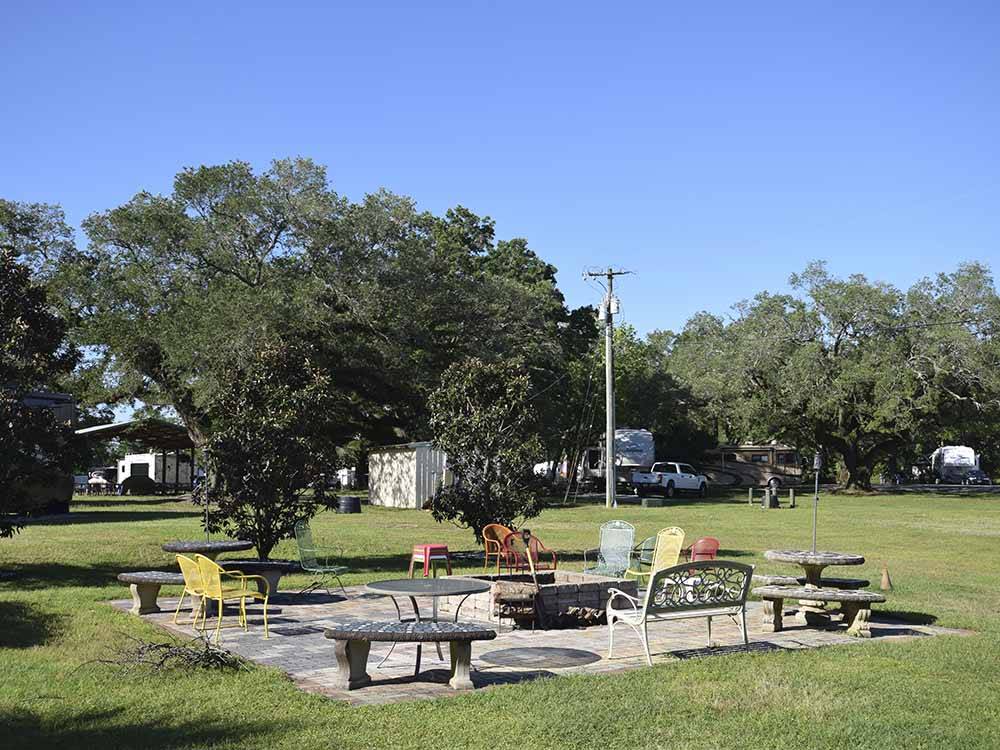 A fire pit with seating at PENSACOLA RV PARK