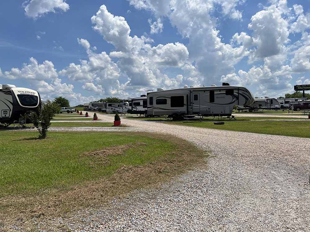 A turn in the gravel road at MONTGOMERY SOUTH RV PARK & CABINS