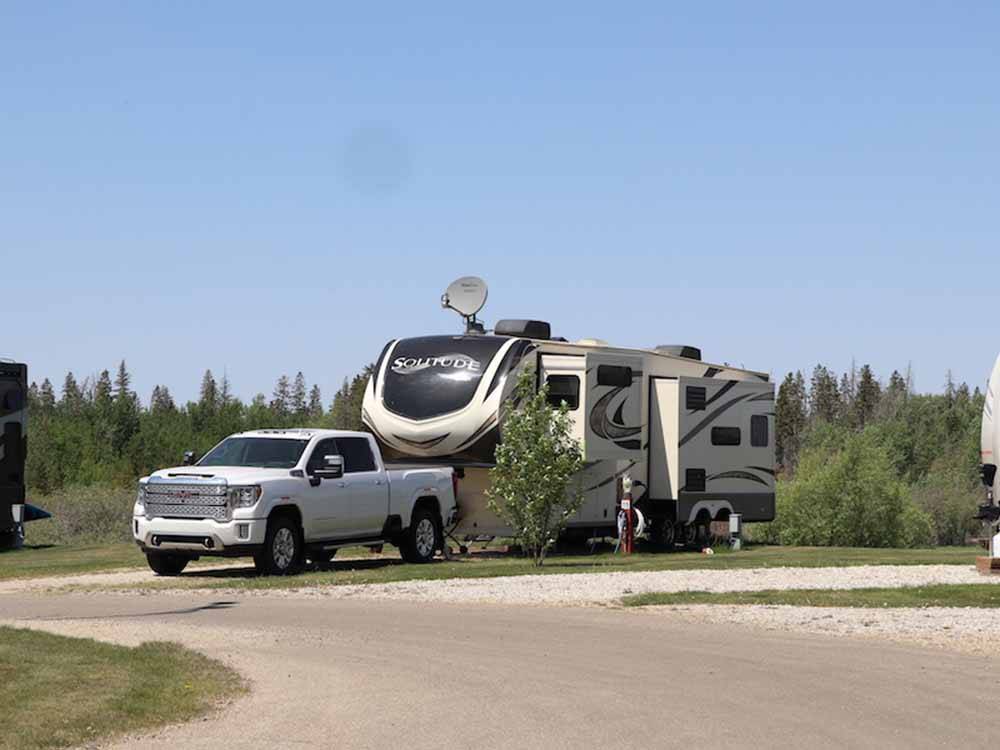 Camping fifth-wheel and pickup truck at ST. ALBERT RV PARK