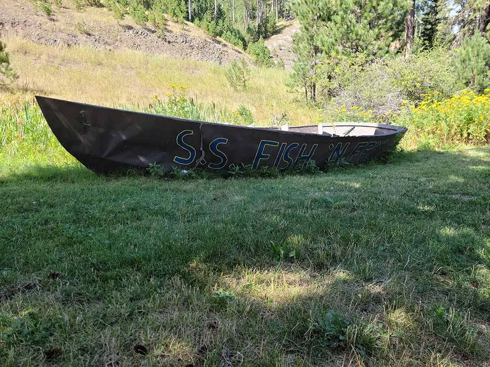 Rowboat on land with S.S. Fish 'n Fry painted on it at FISH'N FRY CAMPGROUND & RV PARK