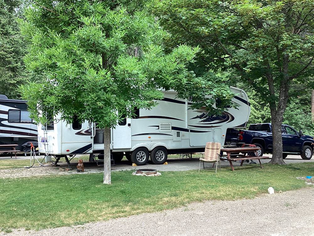 Fifth-wheel near picnic table at site at CAMPGROUND ST REGIS
