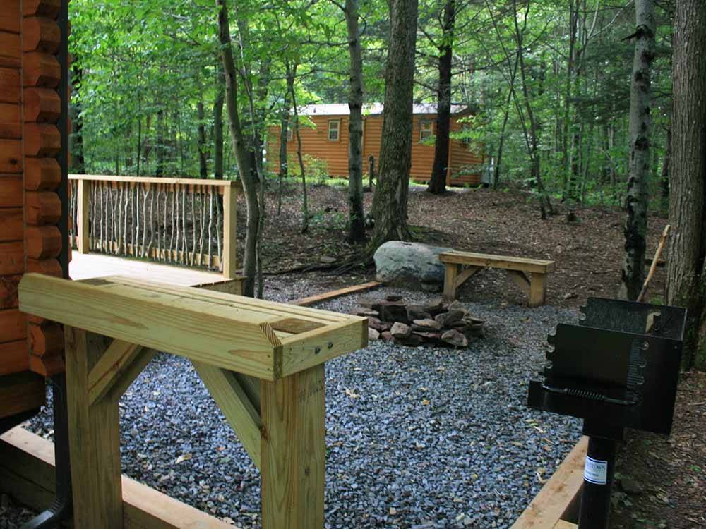 A BBQ area next to the rental cabin at PIONEER CAMPGROUND