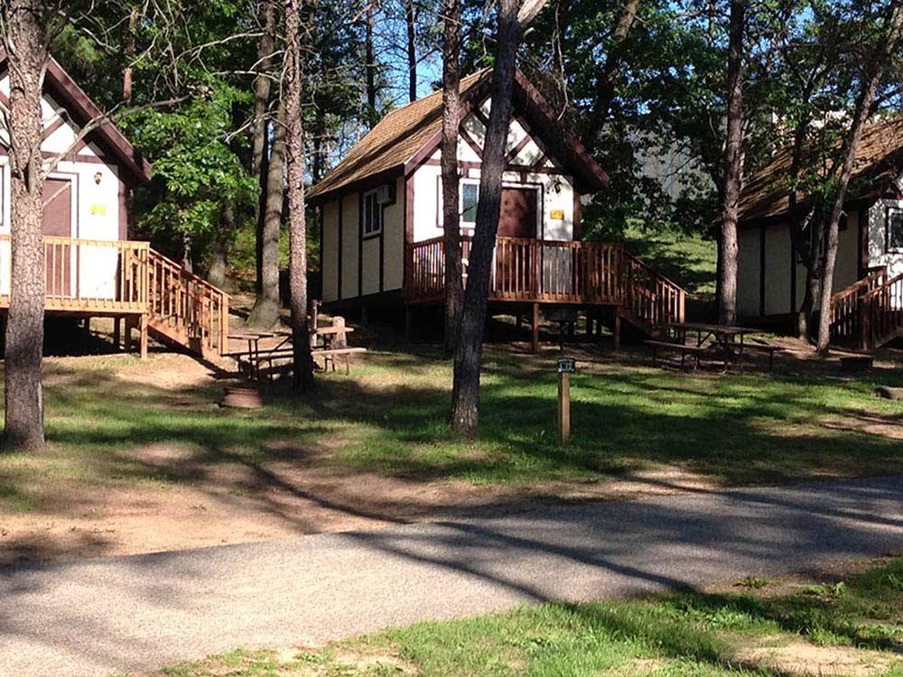 Cabins with decks at SHERWOOD FOREST CAMPING & RV PARK