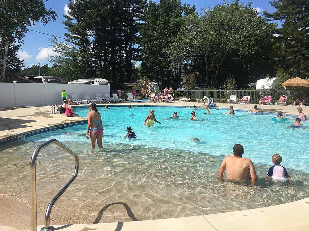 A group of people in the pool at SEA-VU CAMPGROUND