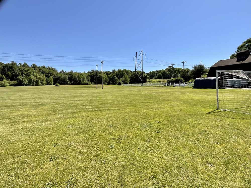 The green soccer field at TIDEWATER CAMPGROUND