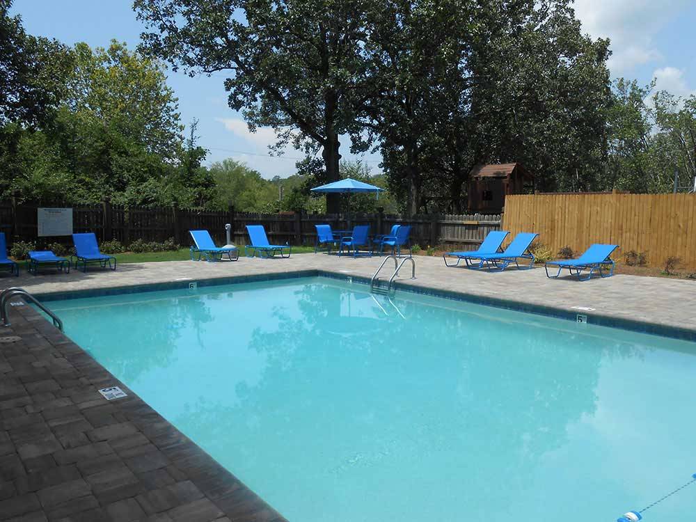 The pool area with chairs at ALLATOONA LANDING MARINE RESORT
