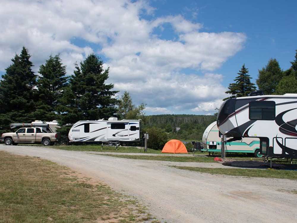 A row of gravel RV sites at PONDEROSA PINES CAMPGROUND