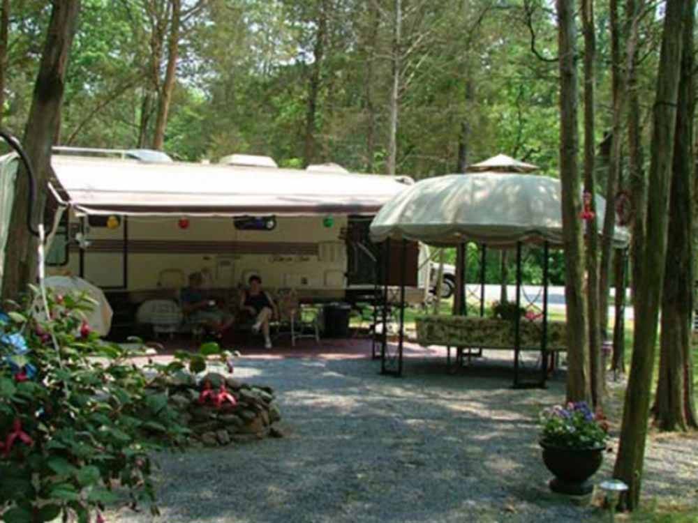 One of the camping areas with trees at DRUMMER BOY CAMPING RESORT