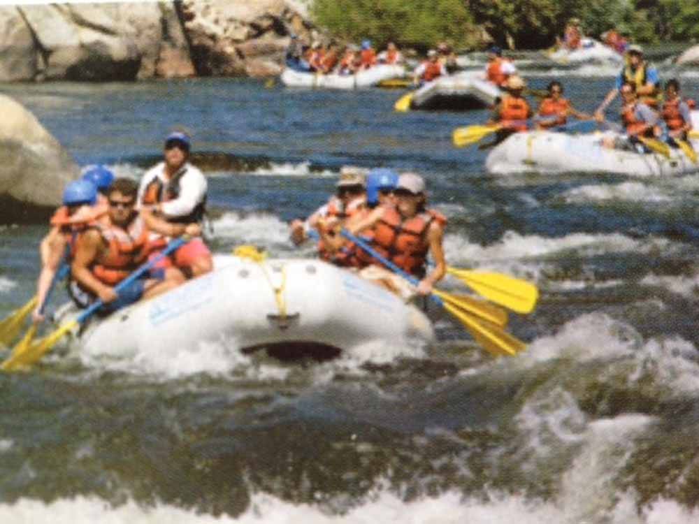 A group of people white water rafting nearby at LAKE ISABELLA RV RESORT