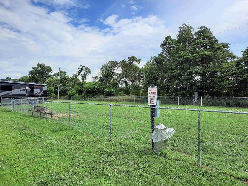 Fenced-in area for pets at ELKHART CAMPGROUND