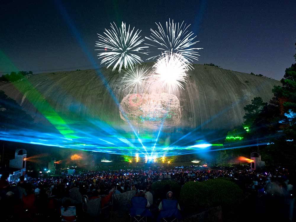 Fireworks and lasers in front of the mountain at STONE MOUNTAIN PARK CAMPGROUND