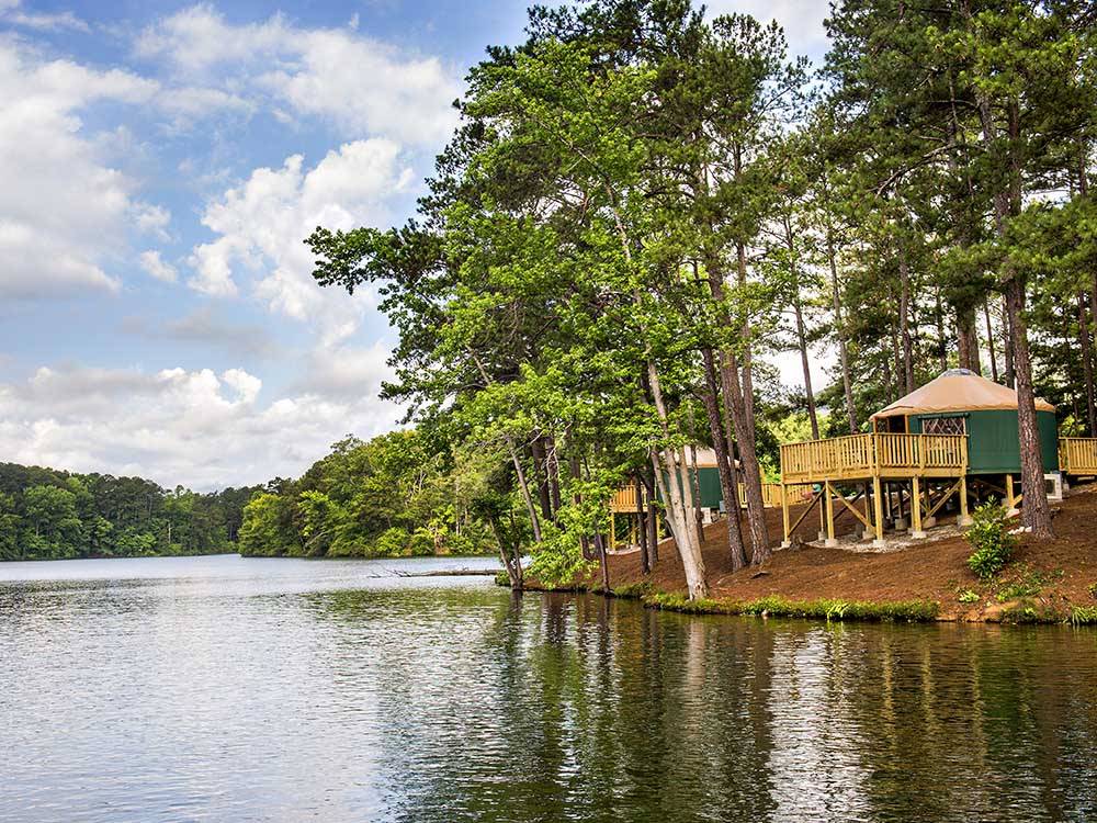 The yurts along the shoreline at STONE MOUNTAIN PARK CAMPGROUND