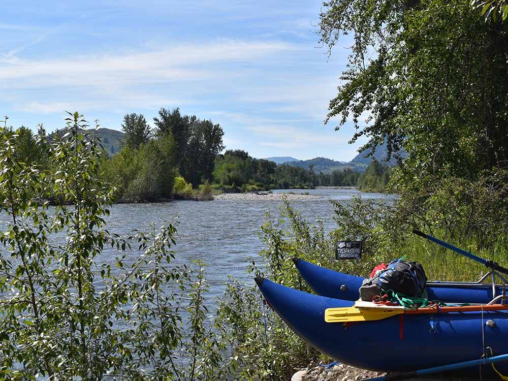 A whitewater raft by the river at RIVERBEND RV PARK OF TWISP