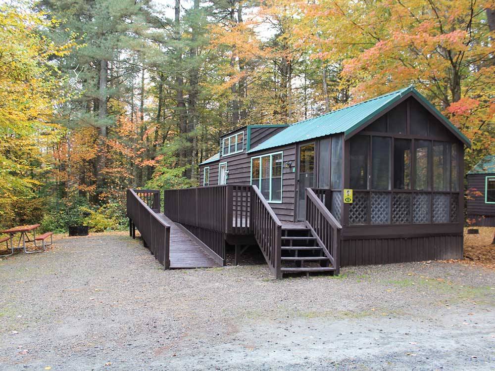 A rental cabin with a wheelchair ramp at JELLYSTONE PARK ™ AT BIRCHWOOD ACRES