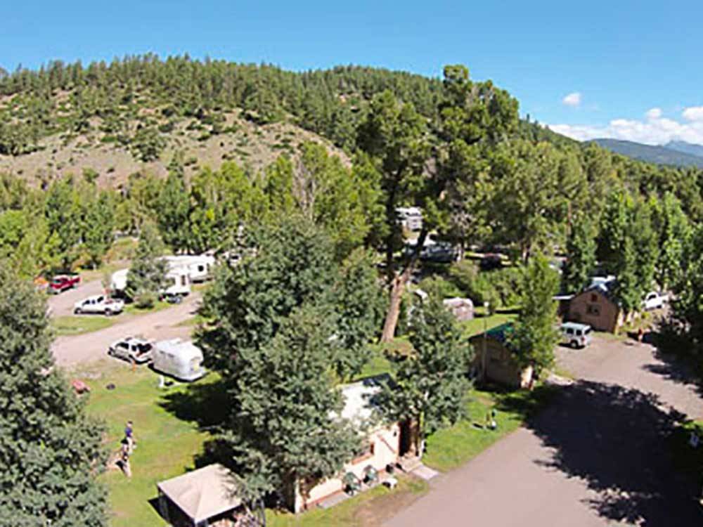 Aerial view over campground, trees and mountainside at PAGOSA RIVERSIDE CAMPGROUND