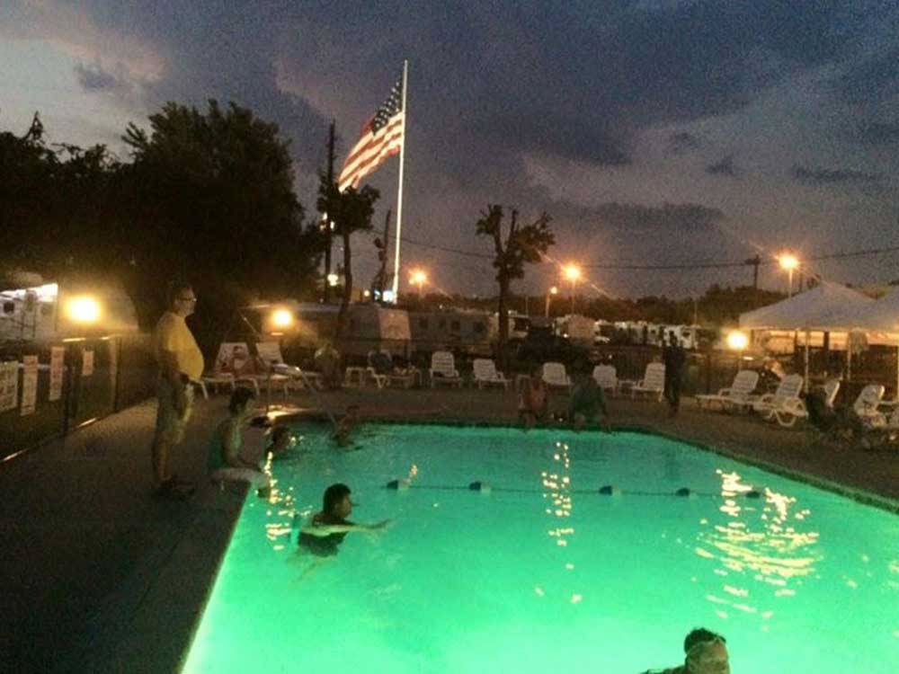 Swimming pool at night at TWO RIVERS CAMPGROUND