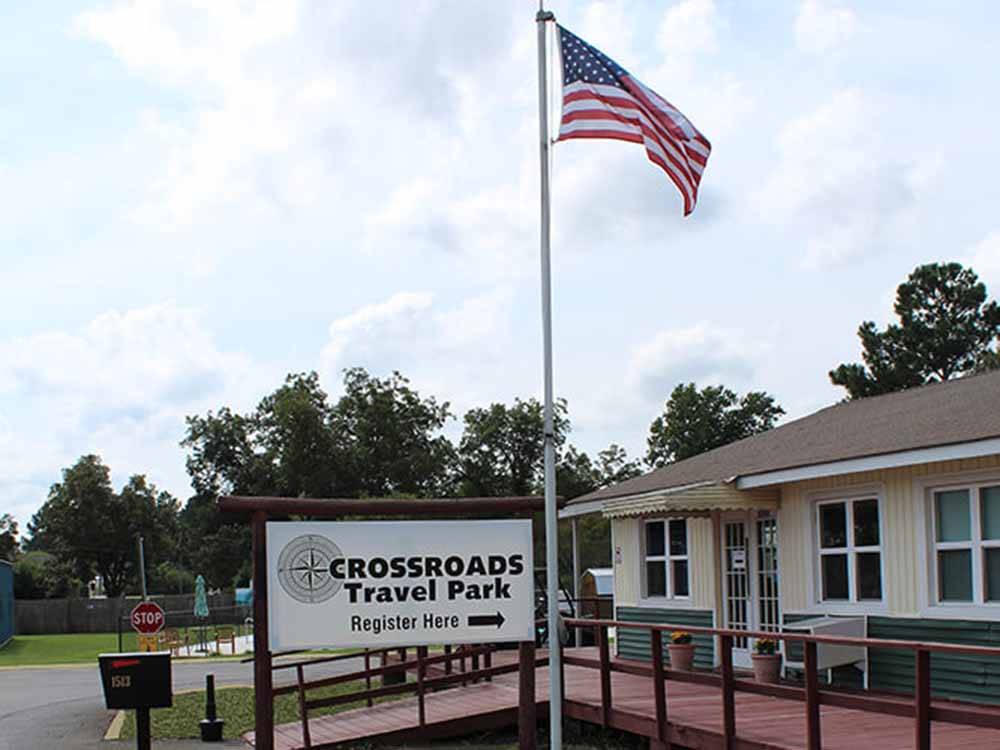 The sign and ramp leading to the office at CROSSROADS TRAVEL PARK
